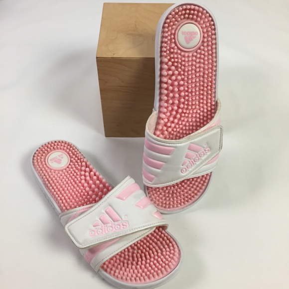 pink and white adidas slides